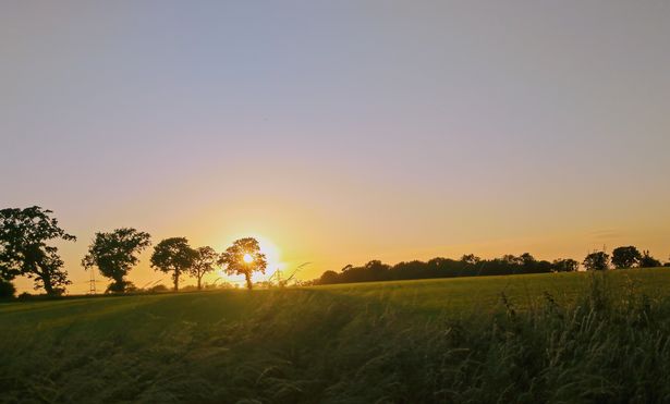 Sunset shot over the Berkshire countryside fields in Burghfield, Reading