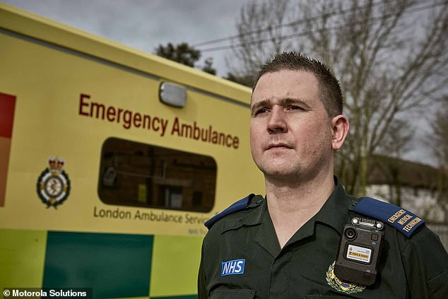 London Ambulance Service rolled out the trial on Monday in areas where emergency workers are considered to be most at risk. Pictured, Emergency Ambulance Crew member Gary Watson, 33, will be among the first to wear one