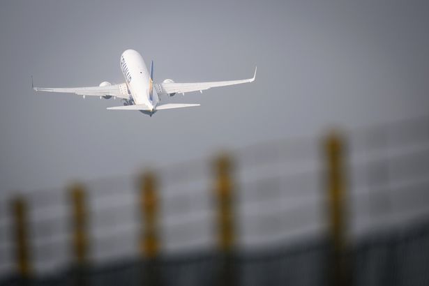 A passenger plane takes off from Luton airport