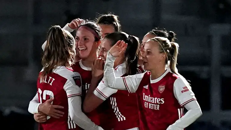 Lotte Wubben-Moy celebrates scoring Arsenal's second in their win over Manchester United